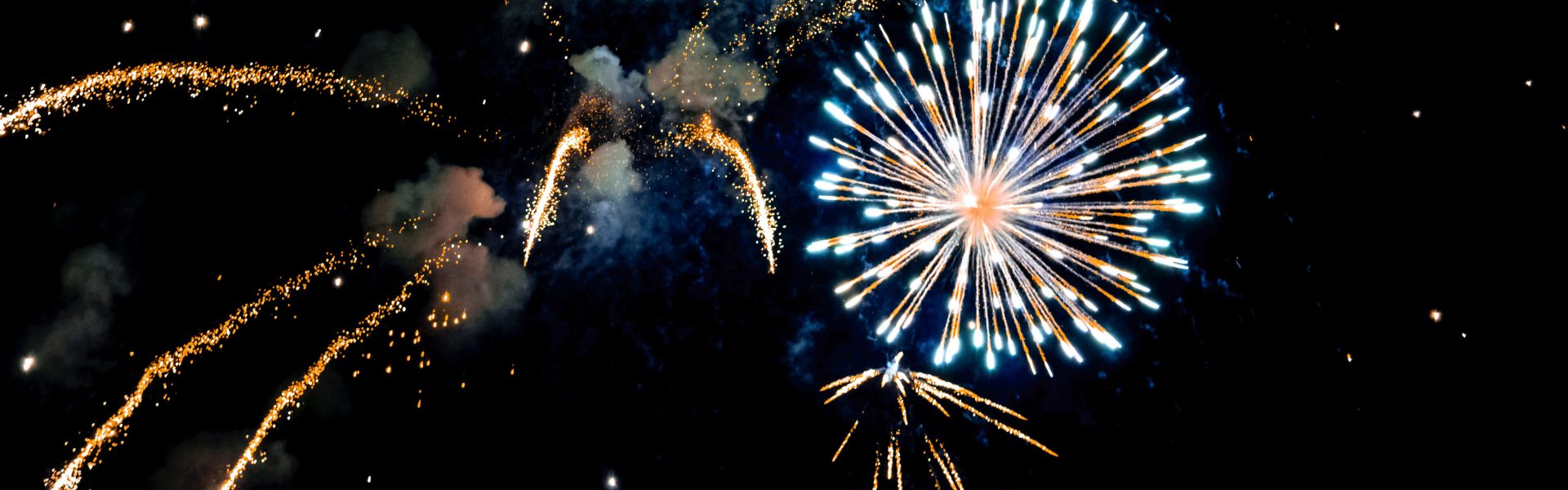 Stock photograph of fireworks in the sky at night