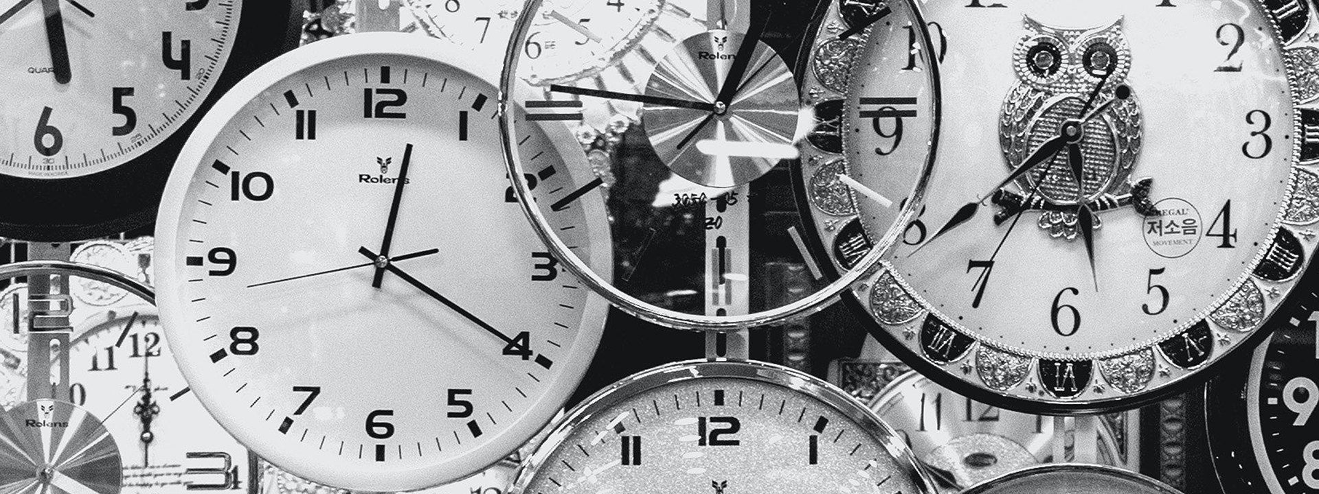 Stock photograph of multiple clocks and times