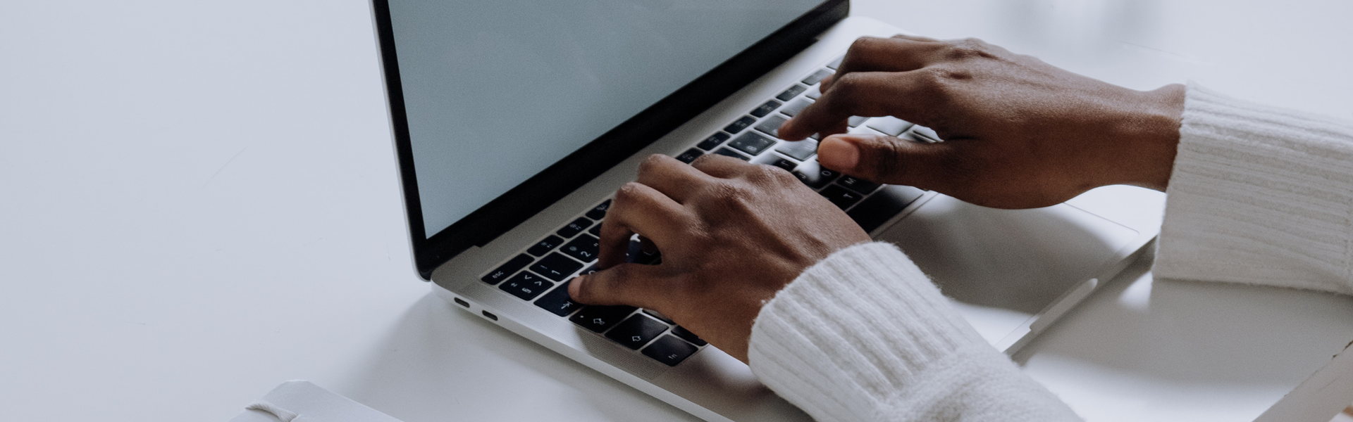 person typing on a keyboard